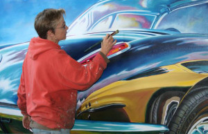 Artist Resume - Lory Lockwood painting Corvette Stingray